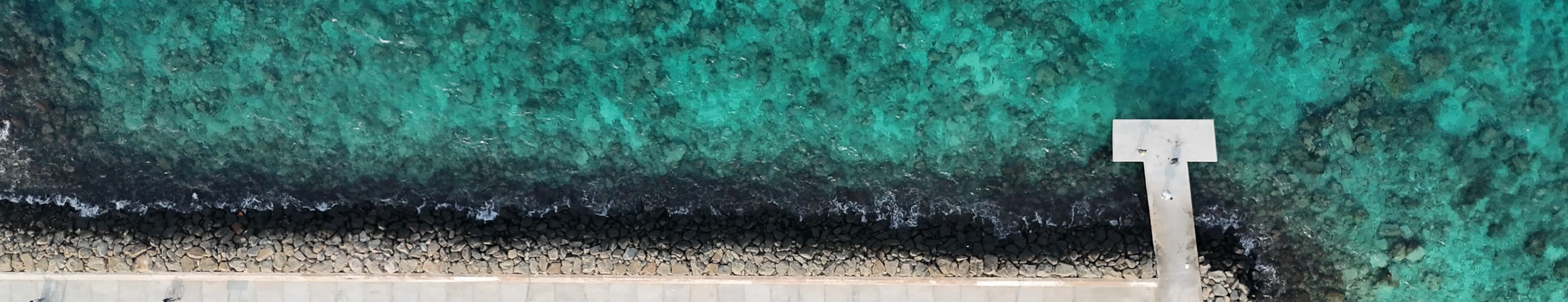 Aerial view of a Maldivian harbour with speedboats